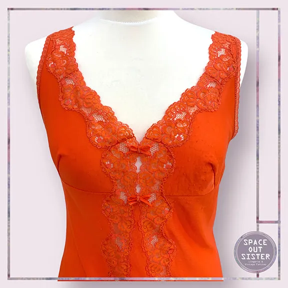 Circa 1960s Vintage Orange Slip with Bows